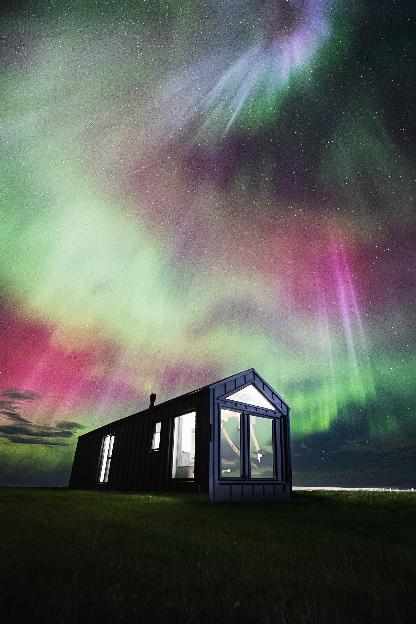 Northern lights over the Northern lights huts. Credit: Patrick Monatsberger Northern lights over the Northern lights huts Iceland