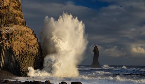 Waves crash hard against the towering basalt columns at Reynisfjara Black Beach. Photo: Þórir N. Kja&hellip;